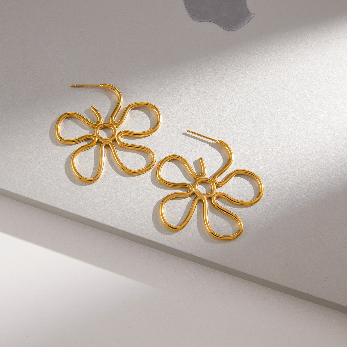 Slim Hollow-Out Flower Stud Earrings — gold earrings, view 2