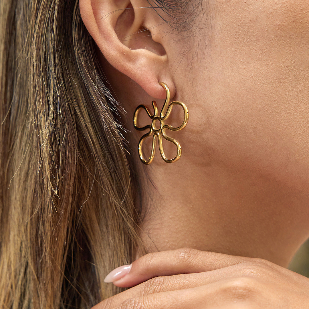 Slim Hollow-Out Flower Stud Earrings — gold earrings, view 5