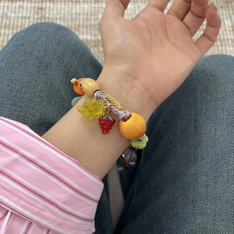 Flower Bead Braided Bracelet — light green bracelet, view 2
