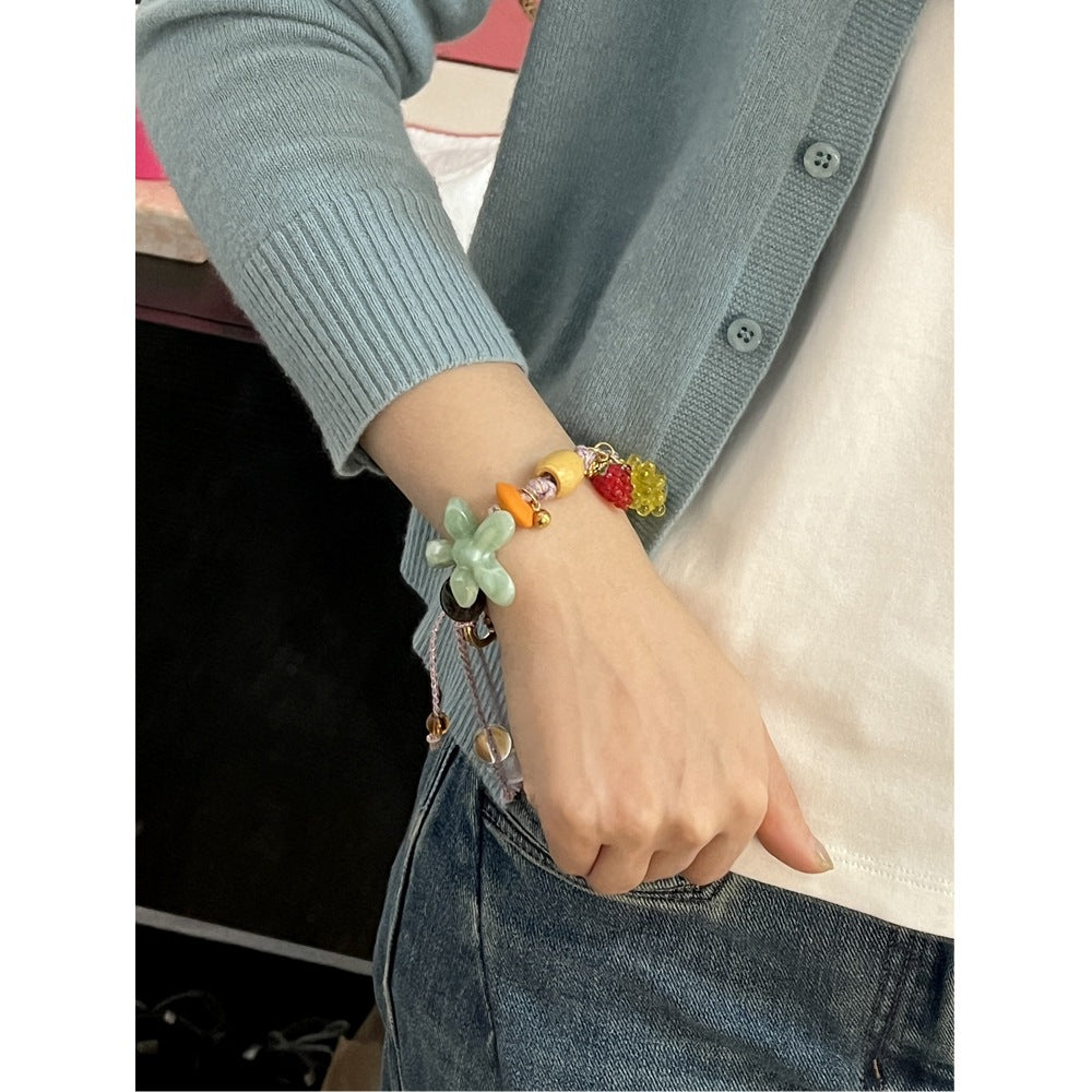 Flower Bead Braided Bracelet — light green bracelet, view 3