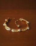 Pearl-Adorned Copper Bracelet — gold bracelet