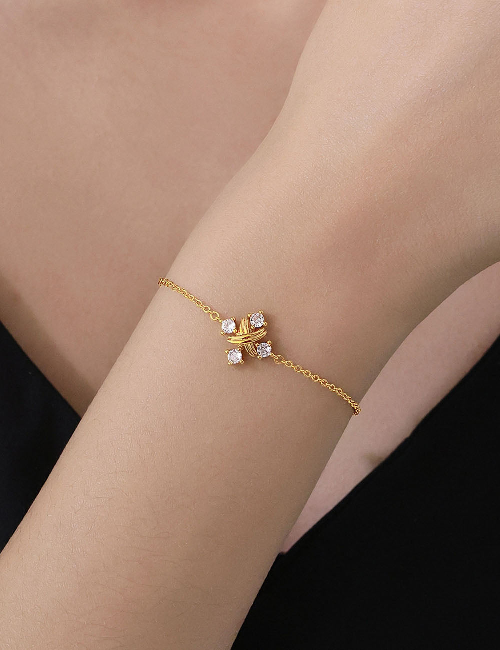 X-Shaped Cubic Zirconia Bracelet — gold bracelet