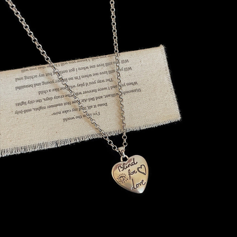 Embossed Heart Pendant Necklace — silver necklace, view 2