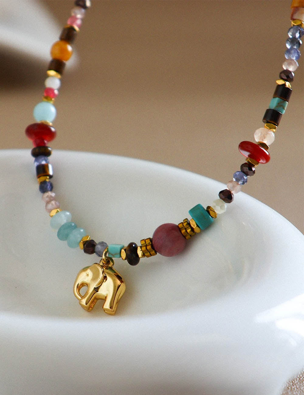 Beaded Necklace With An Elephant Pendant — colorful necklace