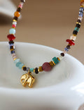 Beaded Necklace With An Elephant Pendant — colorful necklace