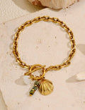 Shell and Pearl Charm Link Bracelet — gold bracelet