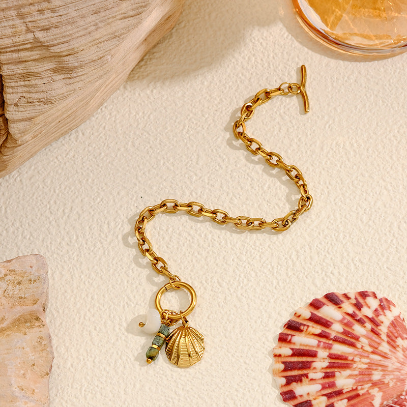 Shell and Pearl Charm Link Bracelet — gold bracelet, view 3