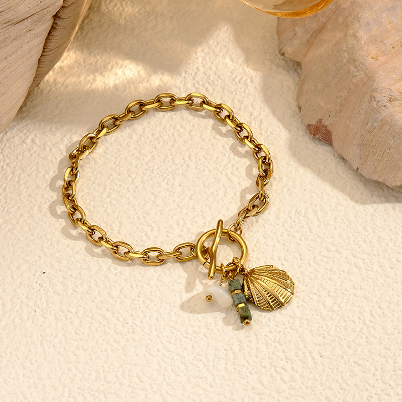 Shell and Pearl Charm Link Bracelet — gold bracelet, view 4