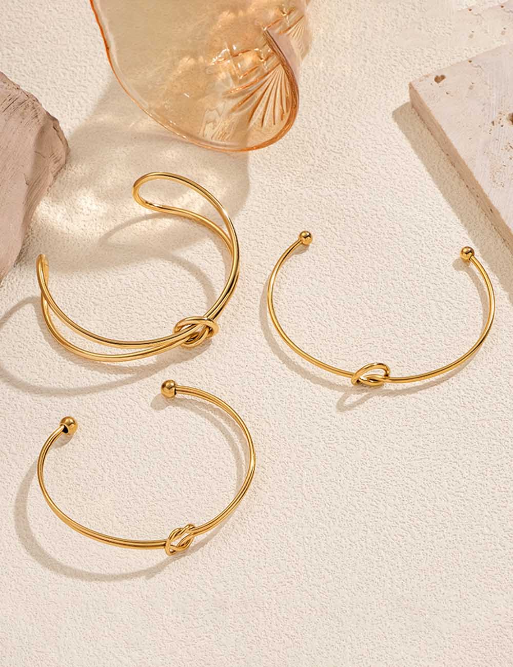Love Knot Open Gold Bangle — bracelet