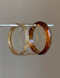 Multi-Layered Geometric Gold Bangle — gold bracelet