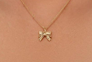 Bow Knot Cross Charm Necklace — necklace, view 10