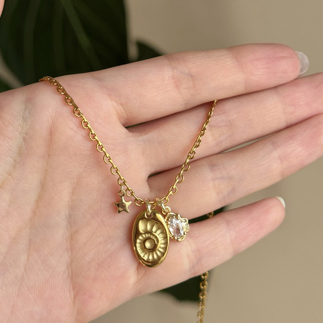 Gold Sea Conch Pendant Necklace — gold necklace, view 4