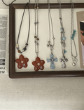 Cross And Flower Pendant Necklace — necklace