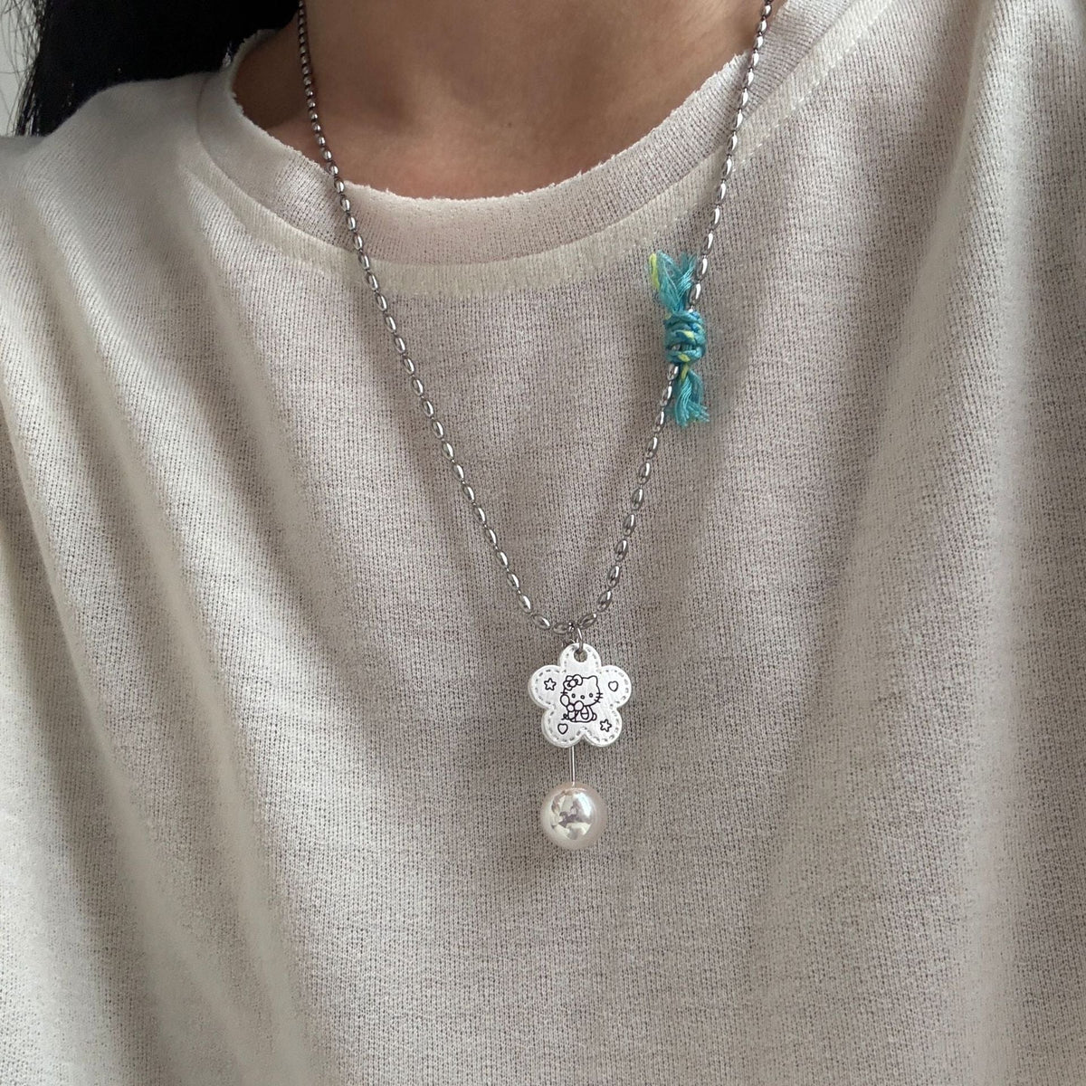 Cross And Flower Pendant Necklace — necklace, view 10