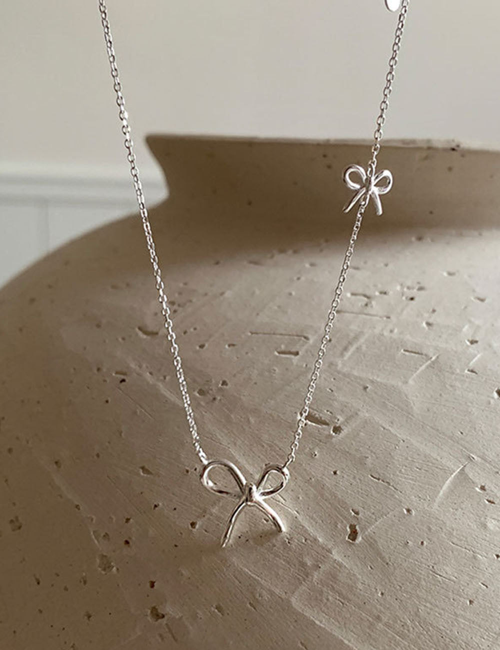 Silver Bow Knot Necklace — silver necklace
