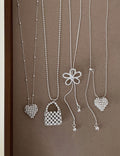 Silver-Plated Flower Heart Necklace — silver necklace