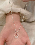 Hollow Flower Pendant Beaded Necklace — silver necklace