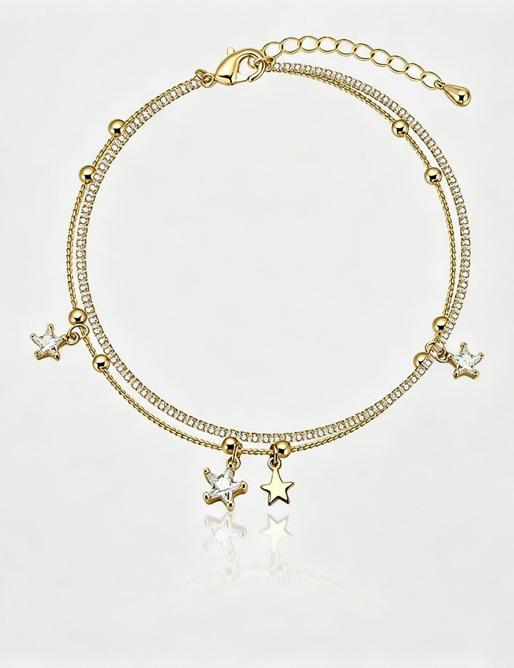 Layered Star Charm Bracelet — gold bracelet