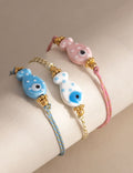 Fish Pendant Braided Bracelet — bracelet