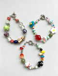 Colour-Contrast Flower Charm Bracelet — bracelet