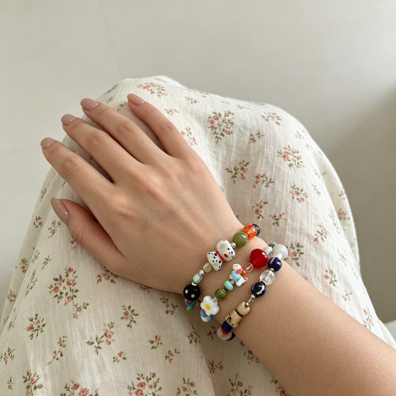 Colour-Contrast Flower Charm Bracelet — bracelet, view 3