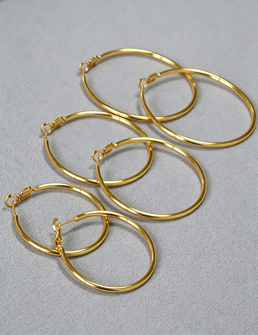 Oversized C-Shape Hoops in Gold Plate — earrings