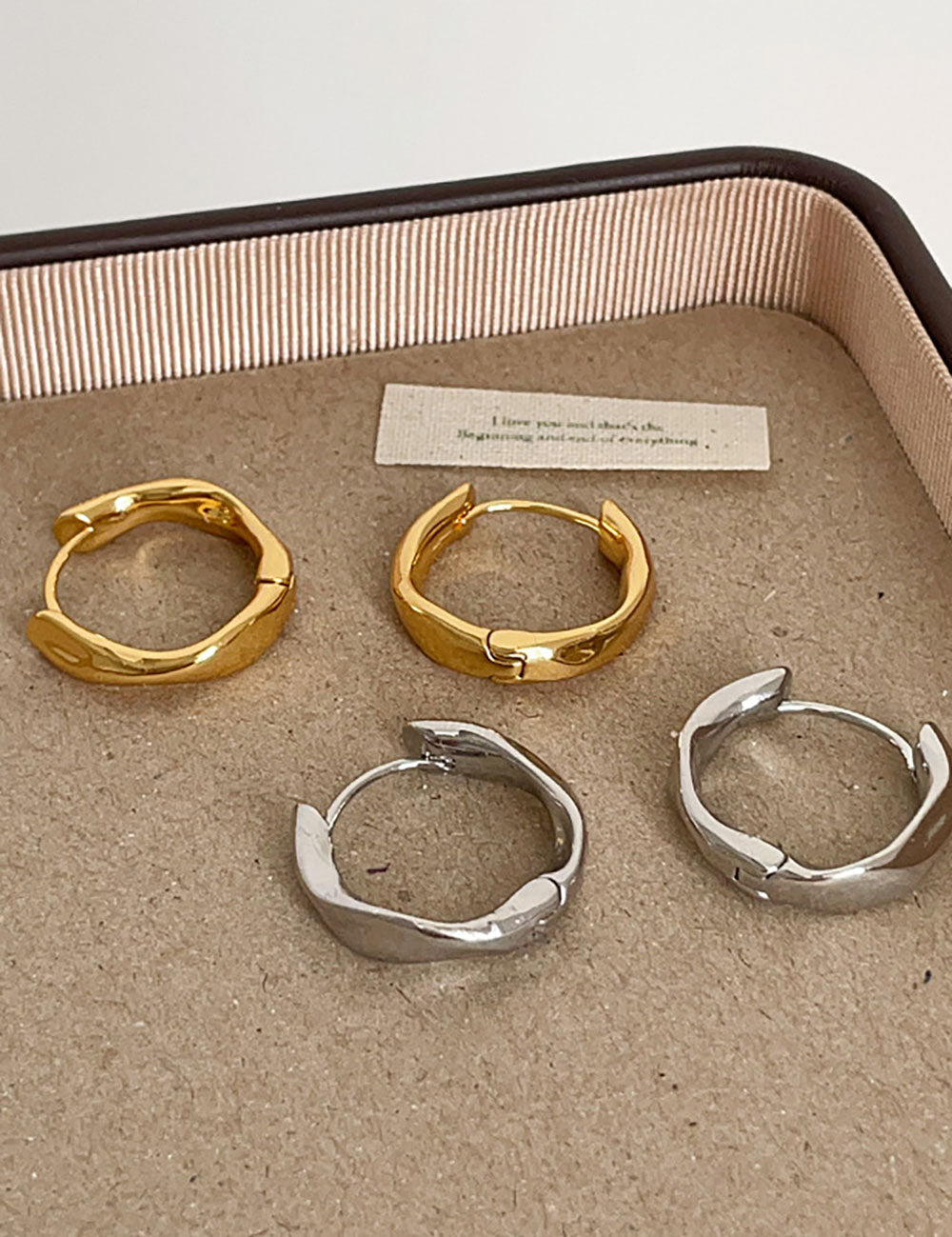 Twist Design Gold Hoop Earrings — earrings