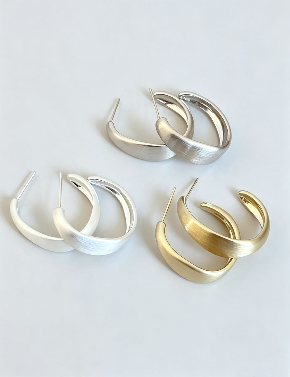 Irregular C-Shaped Stud Earrings — earrings