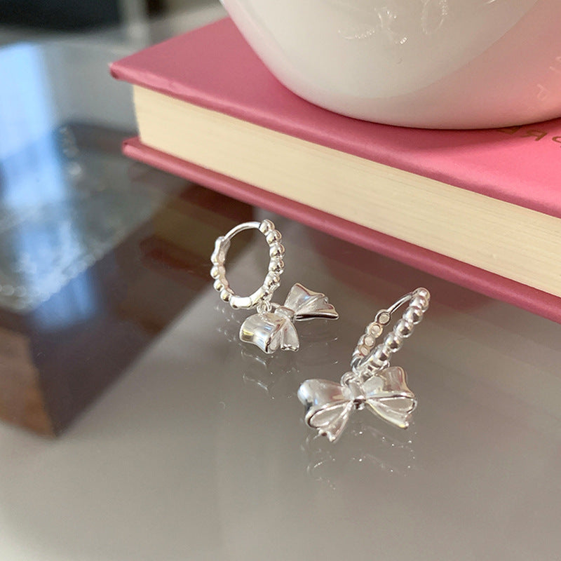 Bow Knot Huggie Hoop Earrings — silver earrings, view 3