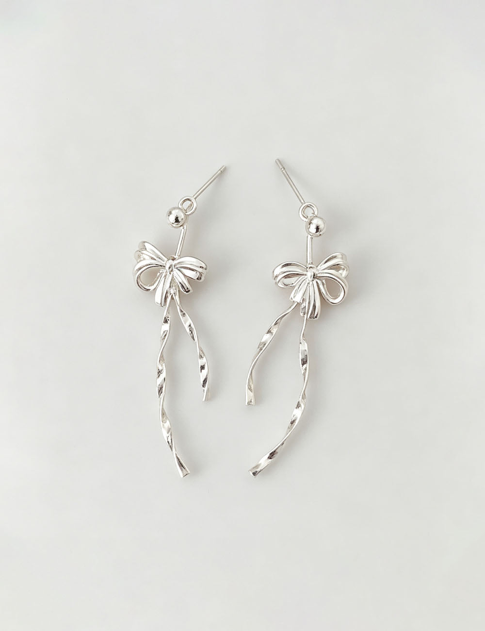 Silver Bowknot Tassel Earrings — silver earrings