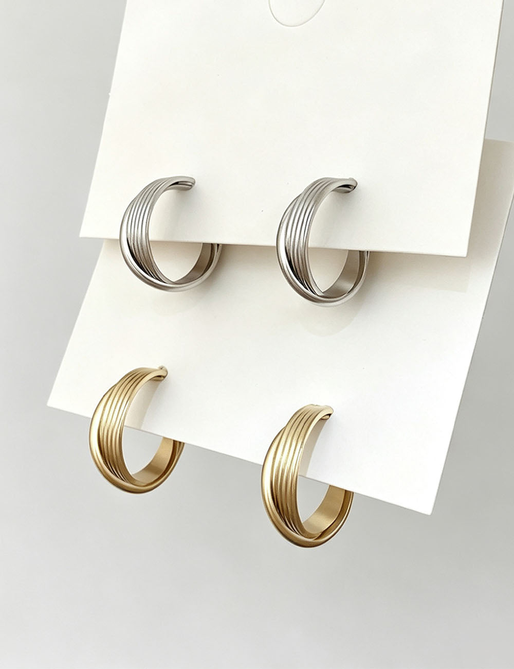 Twisted Geometric Irregular Hoops — earrings