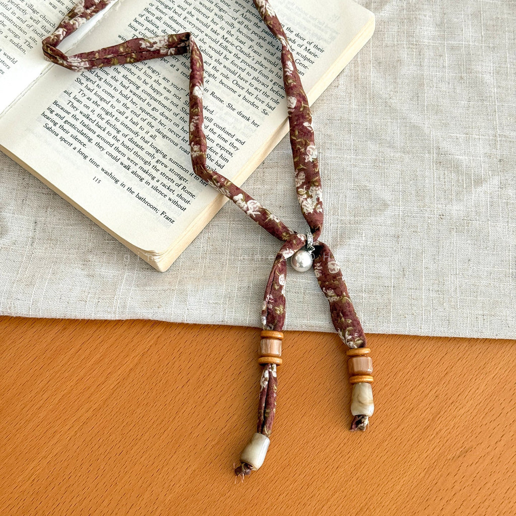 Cashew Print Beaded Necklace — brown necklace, view 3