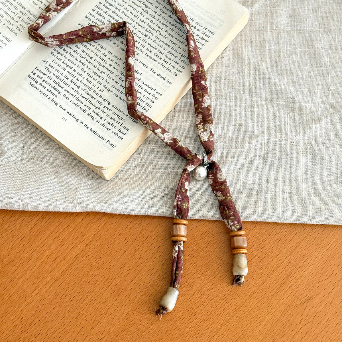 Cashew Print Beaded Necklace — brown necklace, view 3