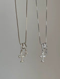 Fine Rhinestone Cross Pendant Necklace — necklace