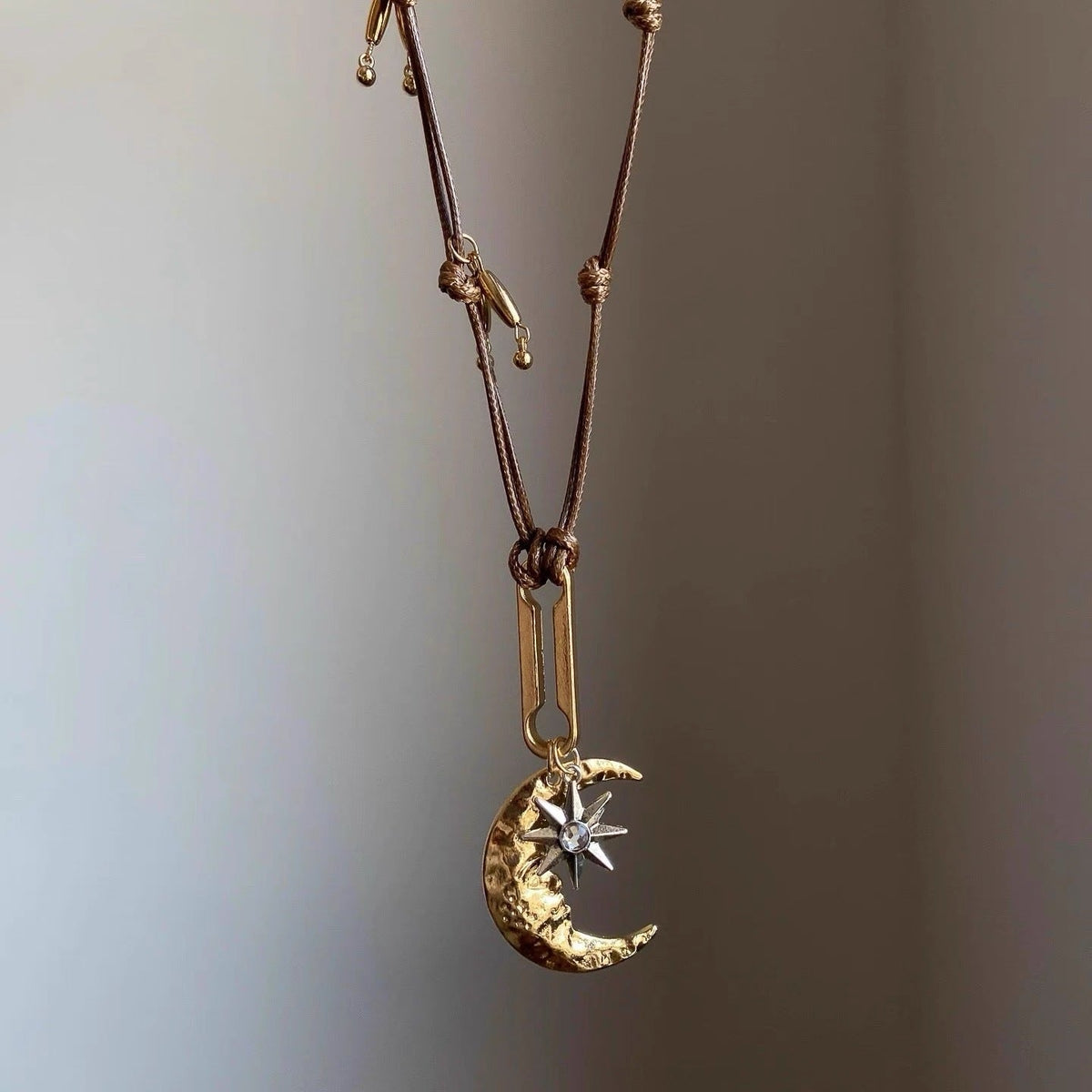 Braided Moon Pendant Necklace — brown necklace, view 2