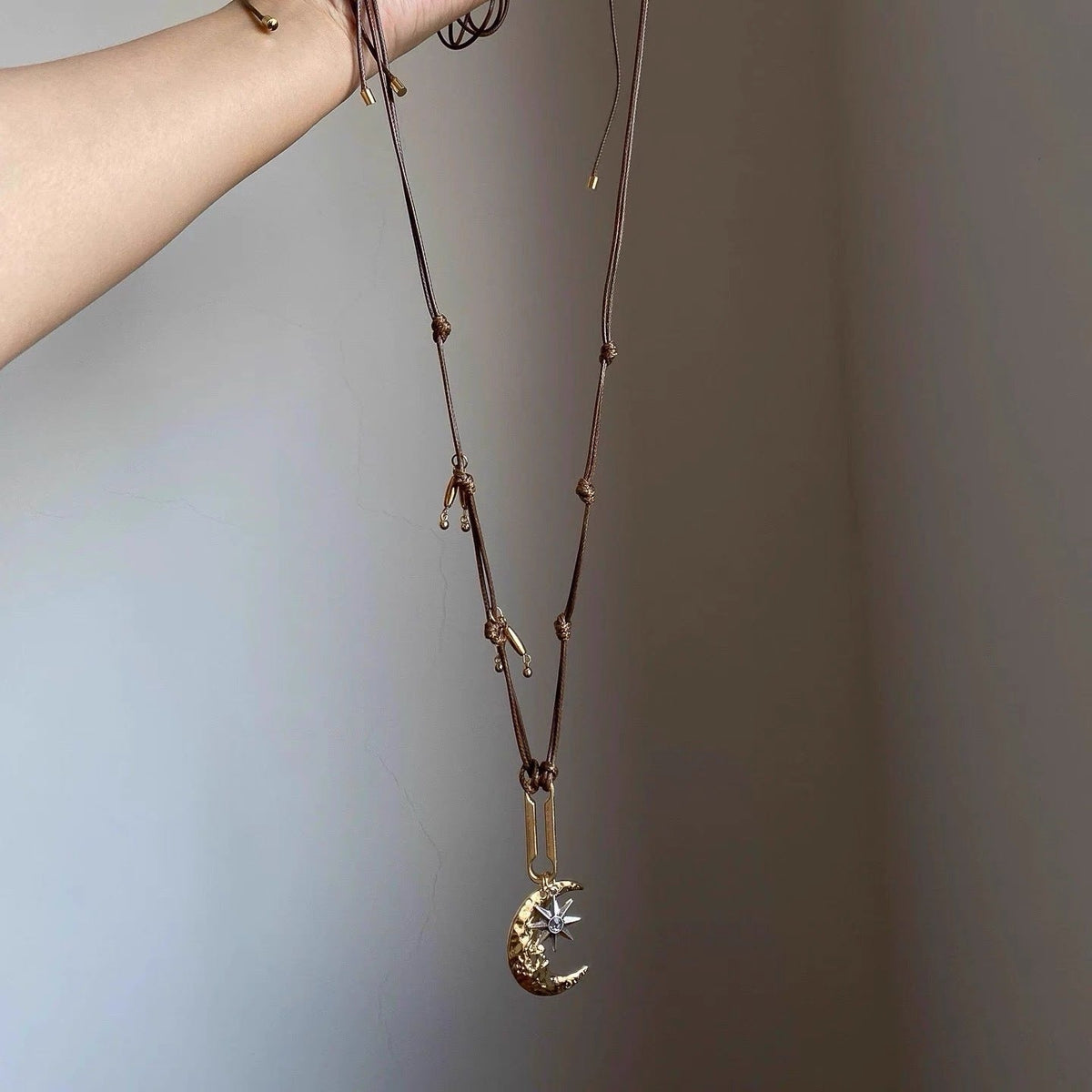 Braided Moon Pendant Necklace — brown necklace, view 3