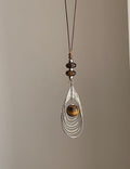 Braided Feather Pendant Necklace — silver necklace