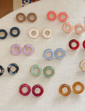 Hollow-Out Round Stud Earrings — earrings